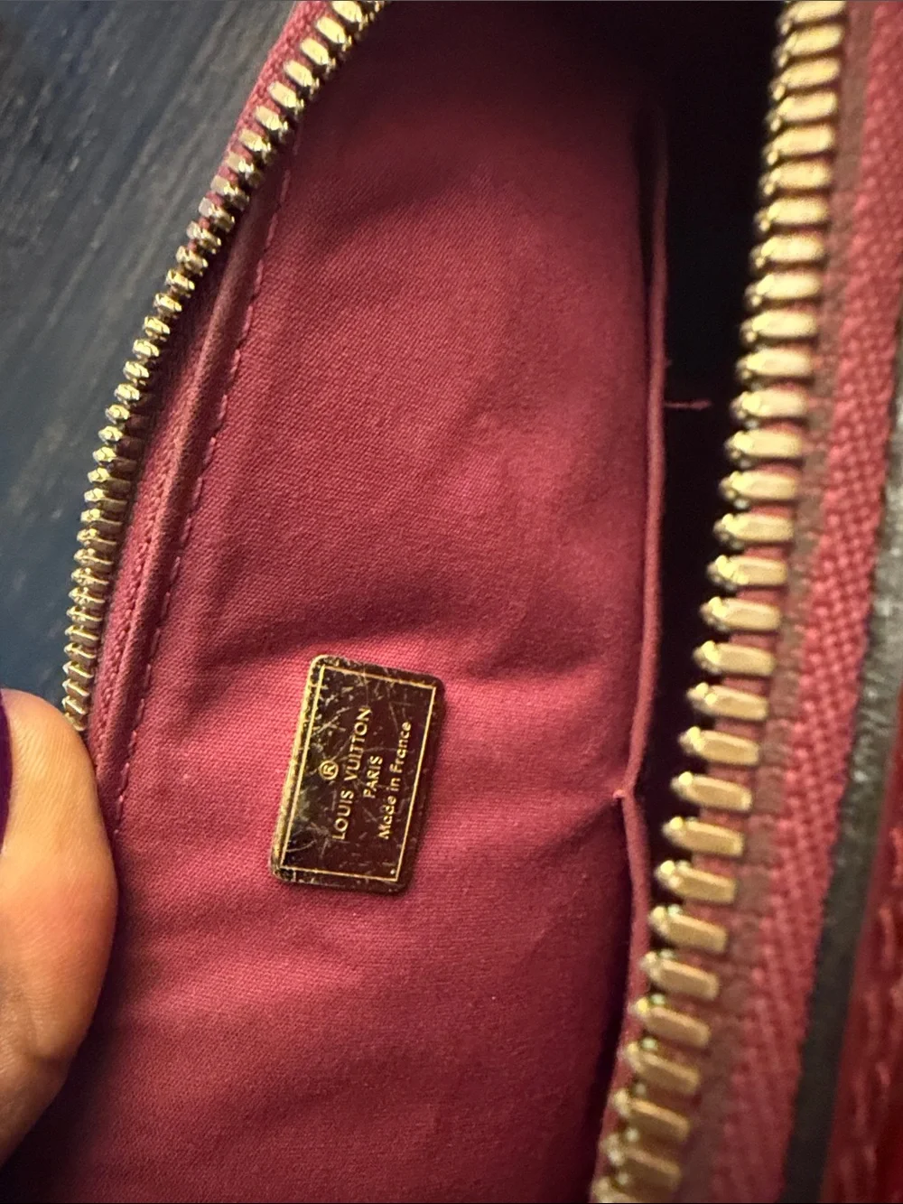 Louis Vuitton Burgundy Leather purse with Gold Hardware